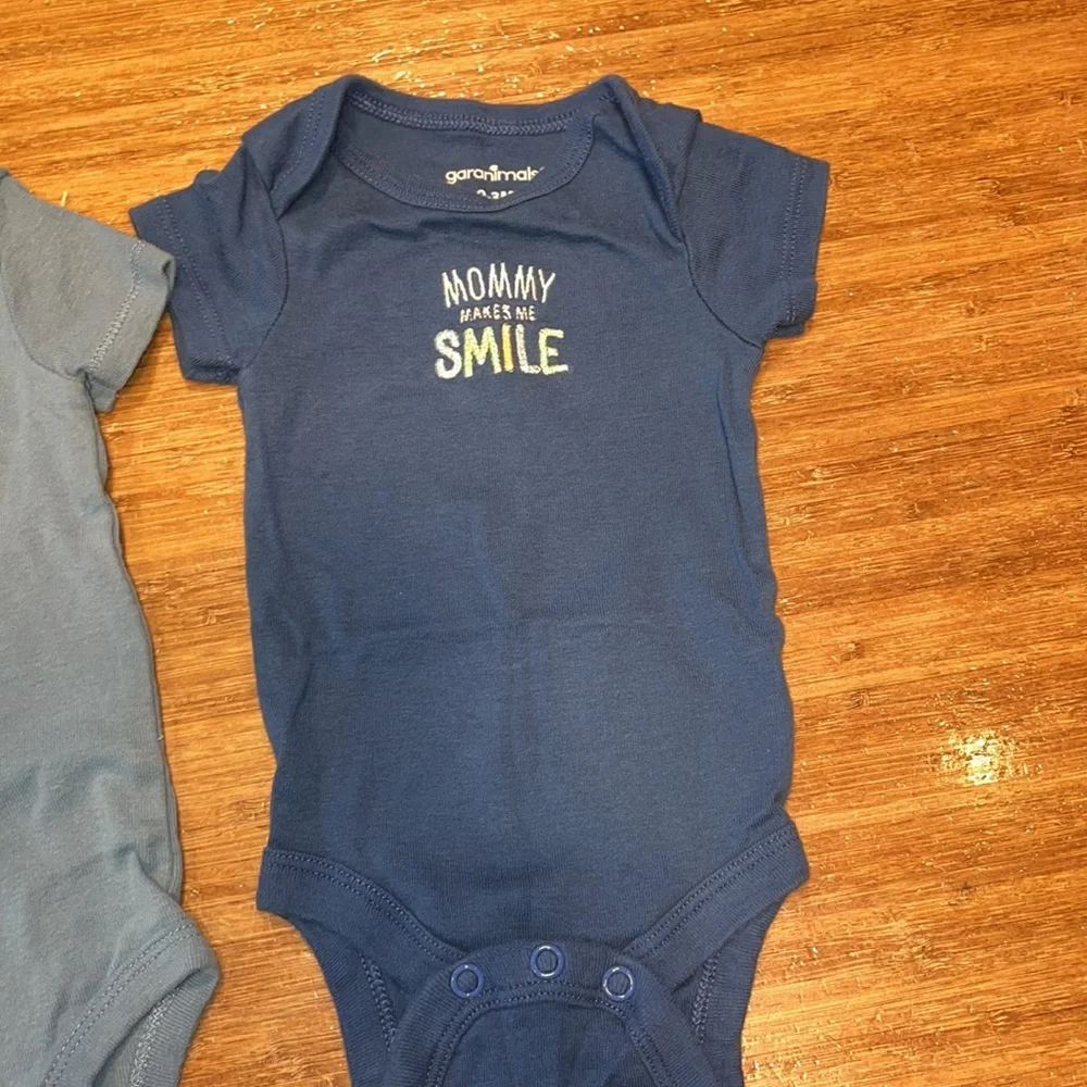 Bundle of baby boy onesies
